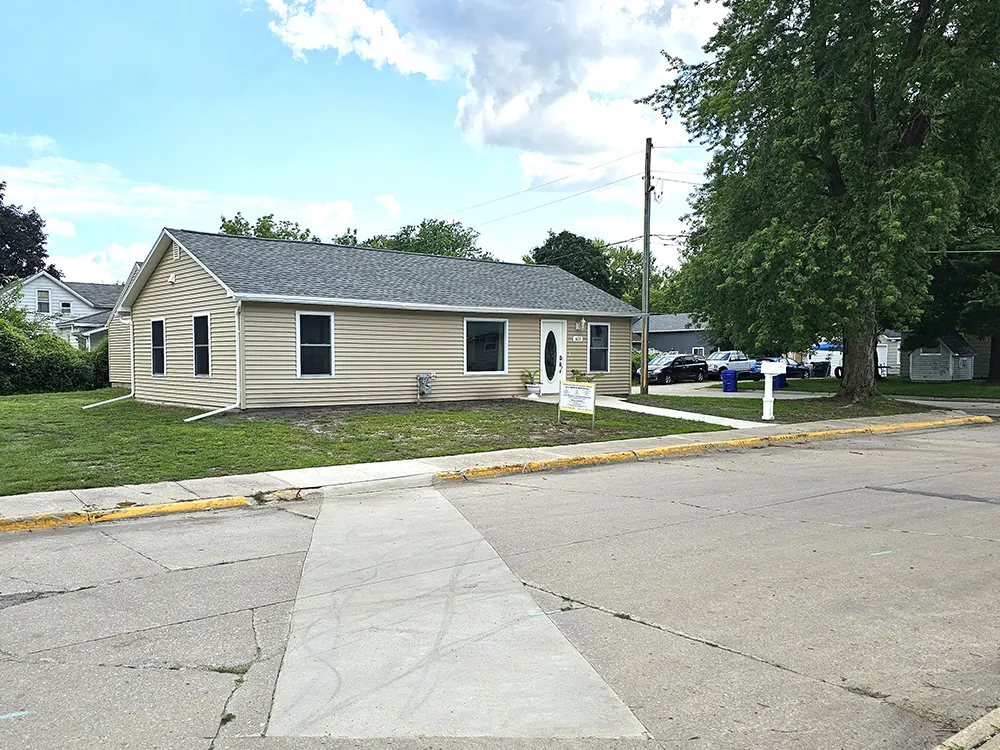 North-East view of the front door on the North side of the House - New sewer and gas lines were ran all throughout the house and into street