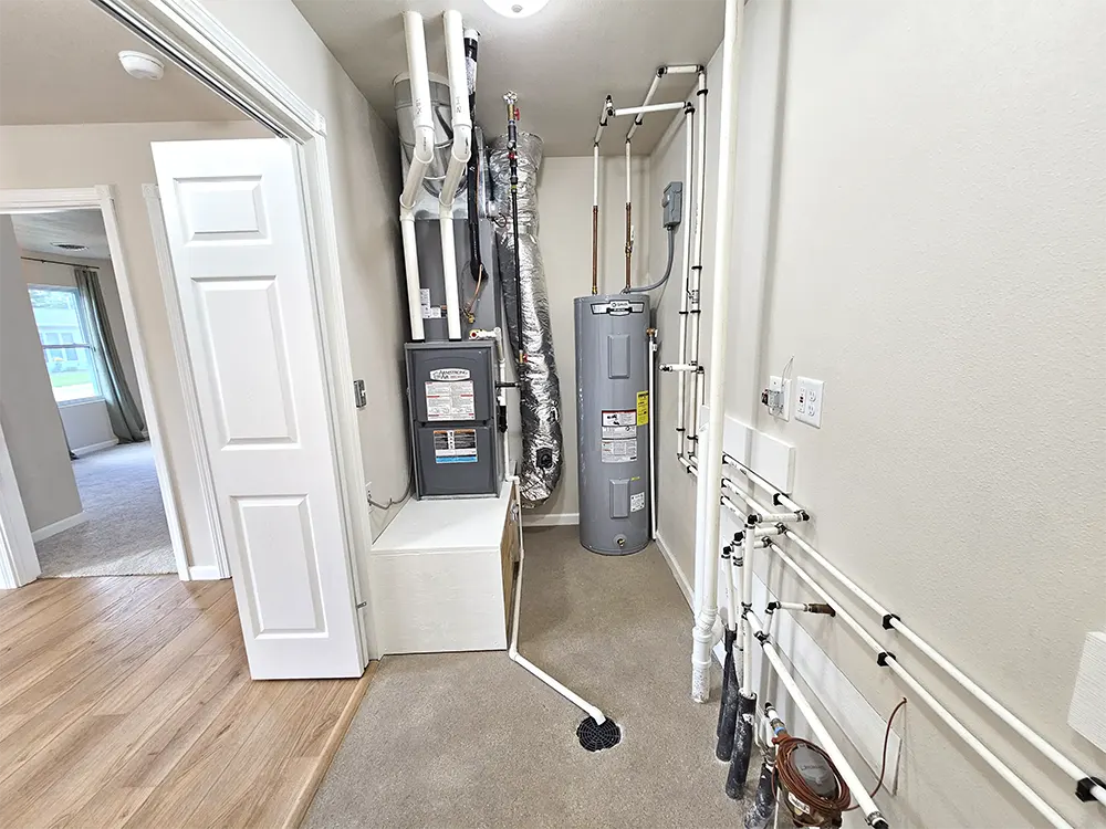 A well-designed utility / laundry area with a new energy efficient furnace and hot water heater.